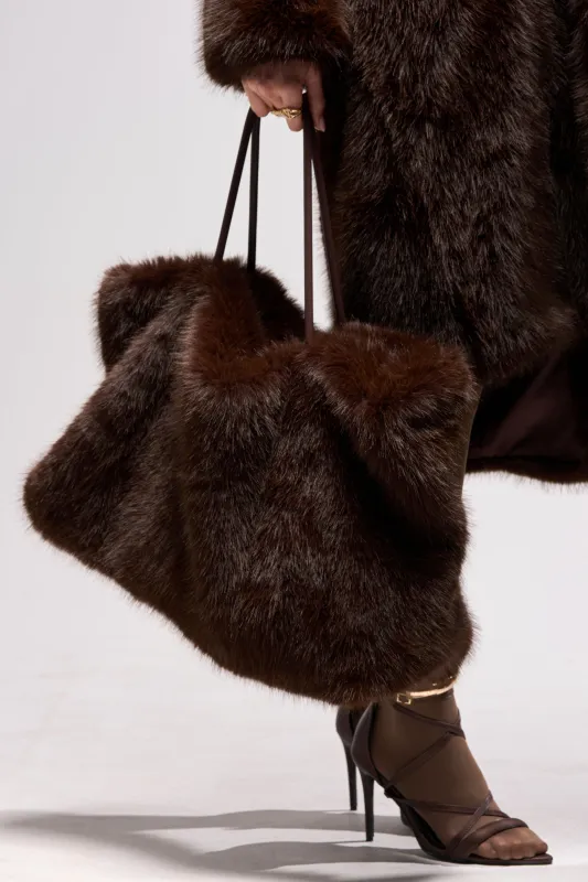 SO RICH FAUX FUR TOTE sold by AKIRA