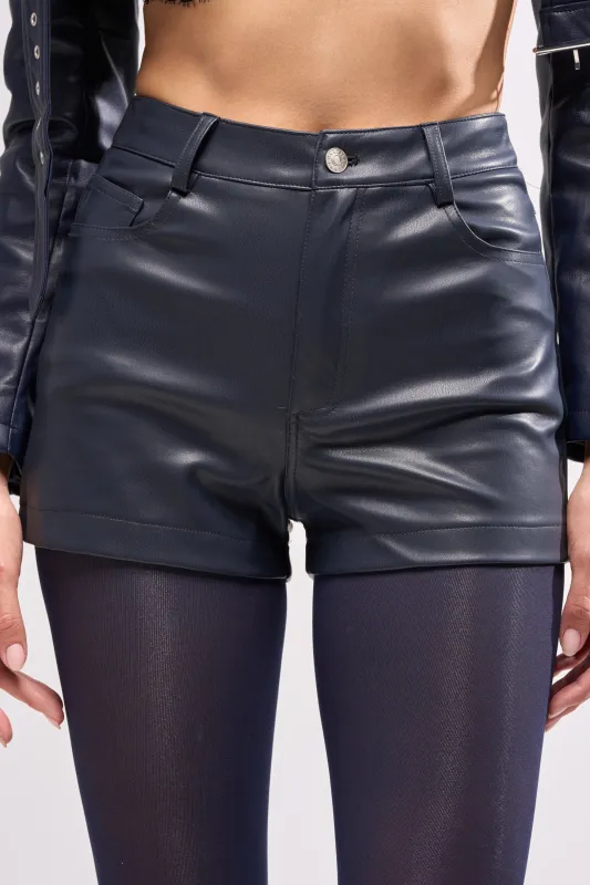 CALLIE FAUX LEATHER SHORT IN NAVY sold by AKIRA