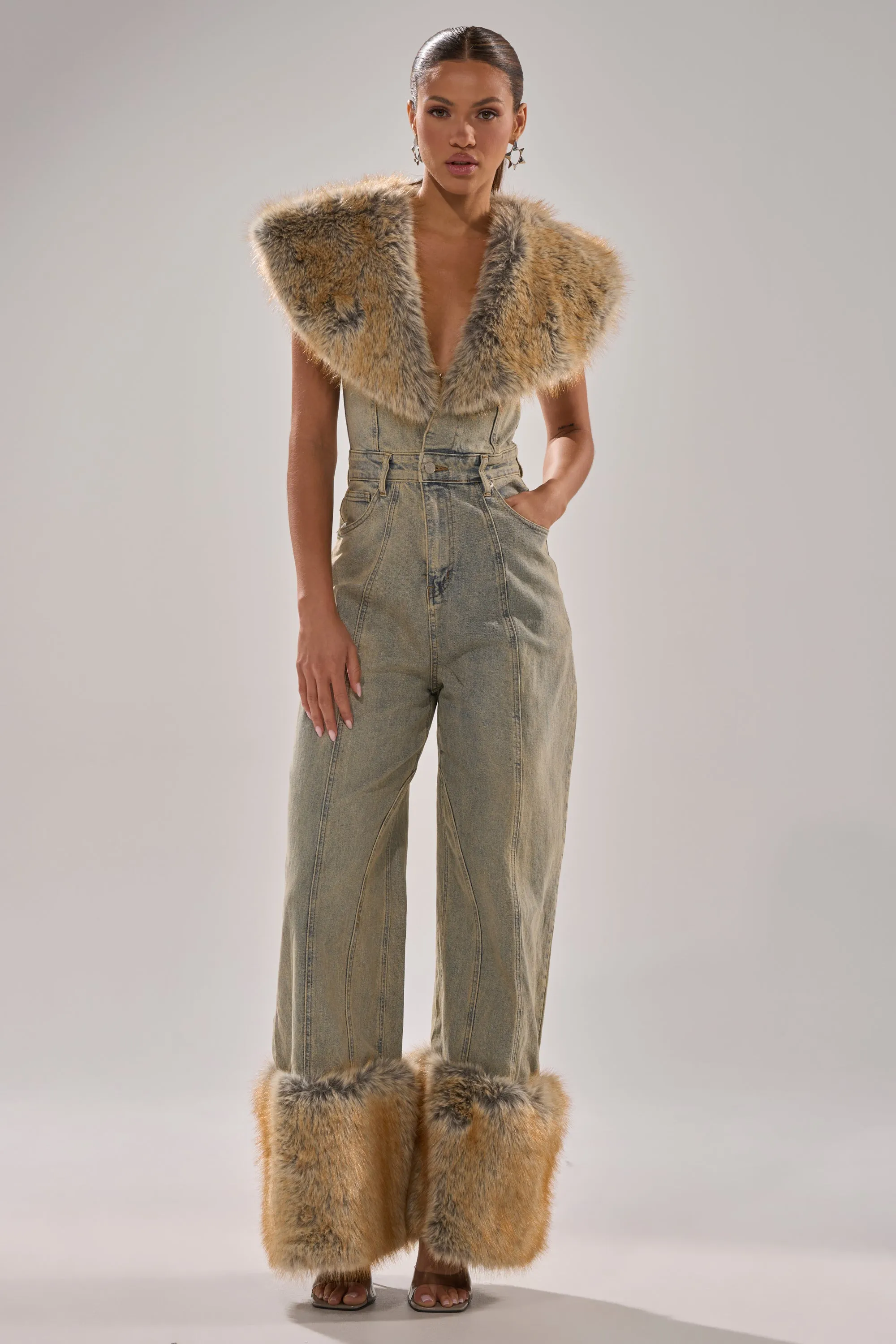 TALK THAT TALK DENIM FUR JUMPSUIT IN VINTAGE BLUE sold by AKIRA