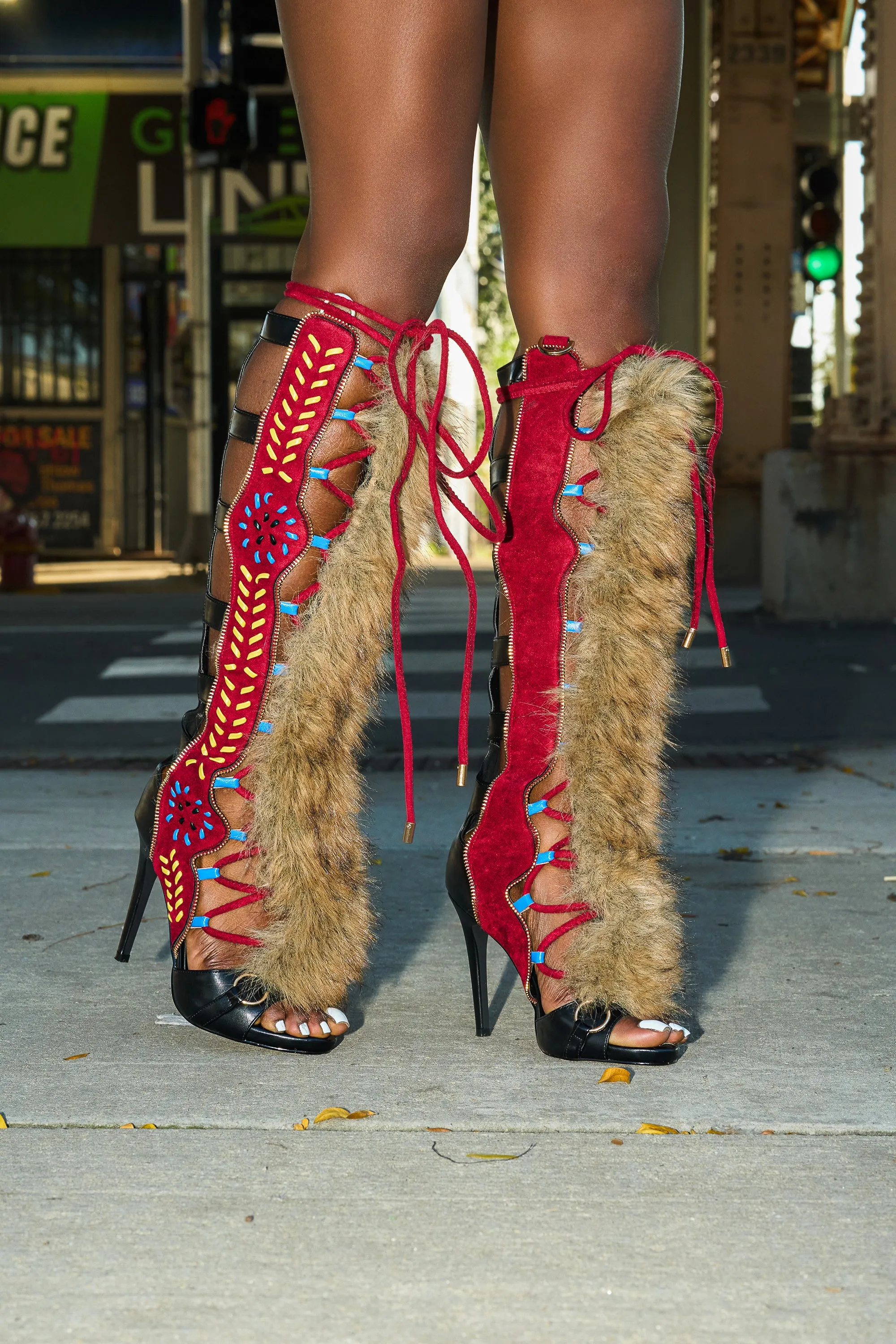 AZALEA WANG SHAINE BLACK MULTI GLADIATOR STITCH AND FUR SANDAL sold by AKIRA