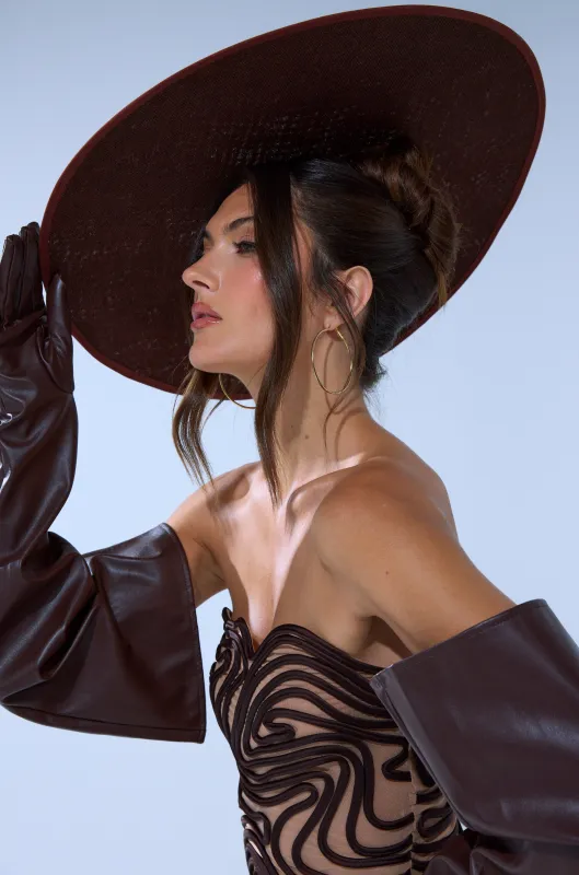 TOO CHIC CLIP ON HAT sold by AKIRA