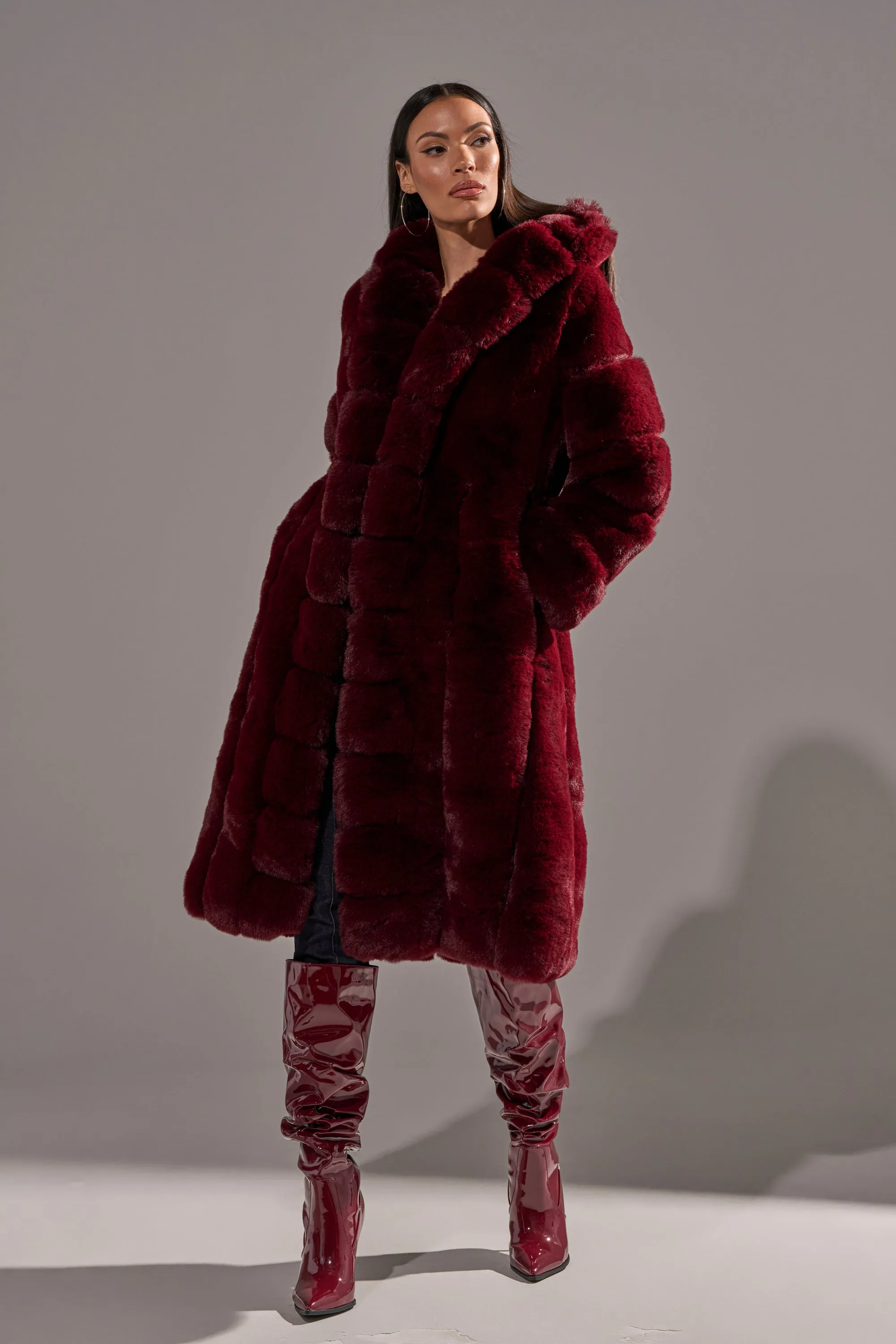 BERLIN HOODED FAUX FUR IN BURGUNDY sold by AKIRA