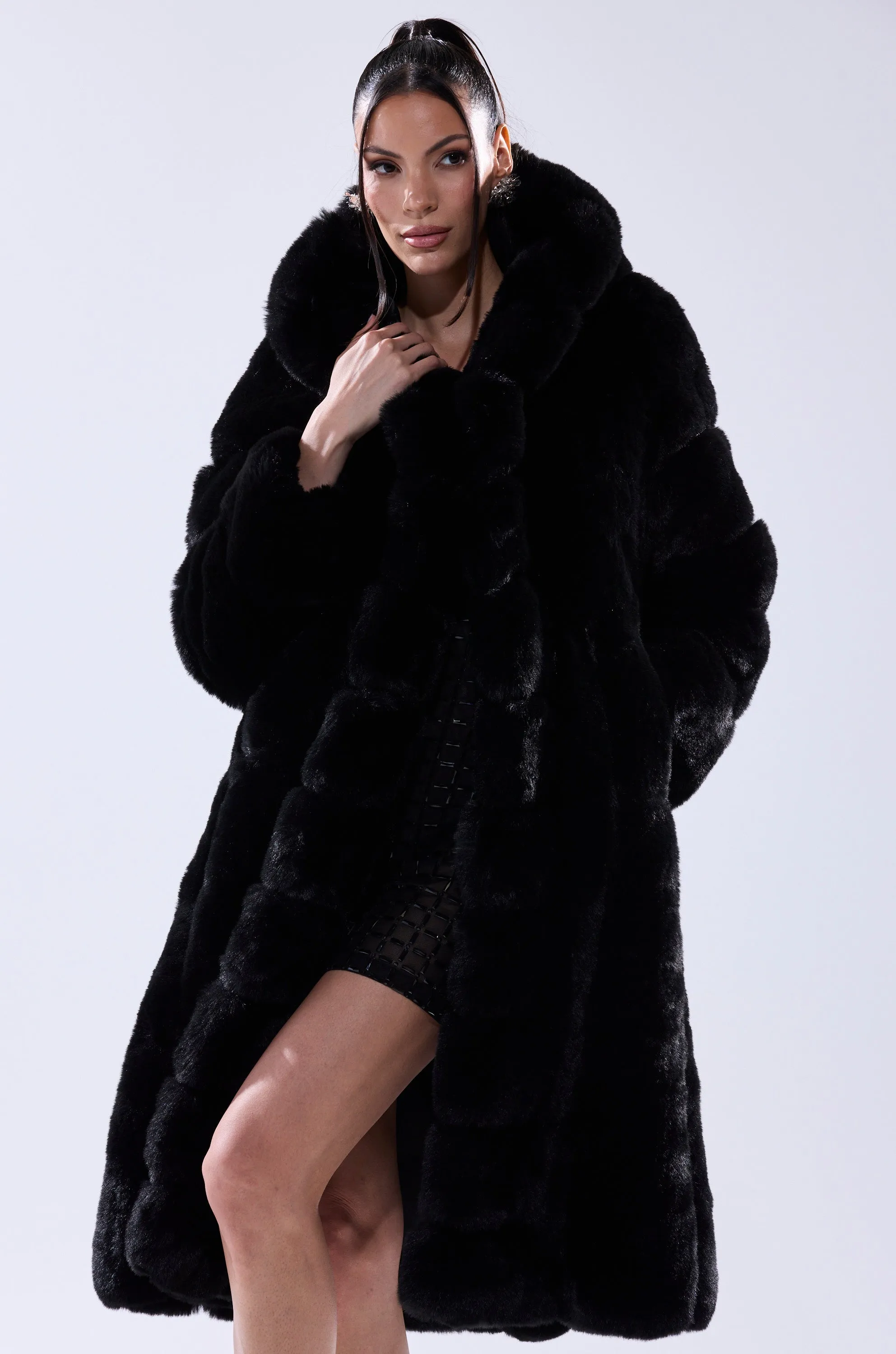 BERLIN HOODED FAUX FUR IN BLACK sold by AKIRA