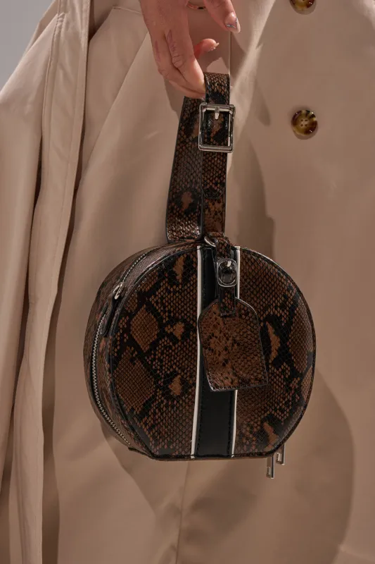 RENEGADE FAUX SNAKE PURSE sold by AKIRA