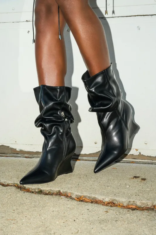 AZALEA WANG ASAF RUCHED WEDGE BOOTIE IN BLACK sold by AKIRA