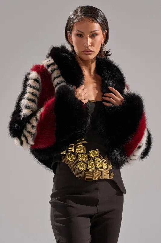 HARD TO FIND PANELED FAUX FUR sold by AKIRA