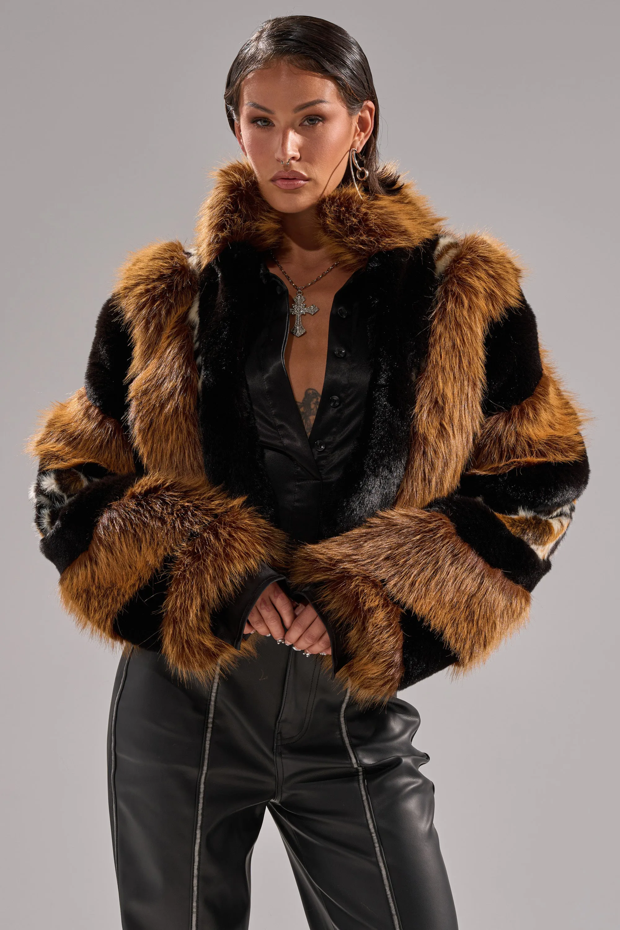 TWISTER PATCHWORK FAUX FUR sold by AKIRA