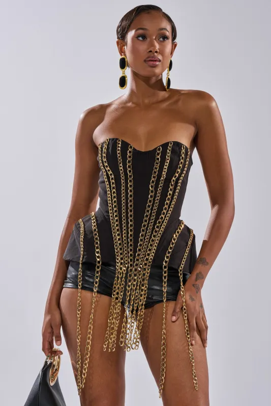 CHAINED DOWN CORSET sold by AKIRA