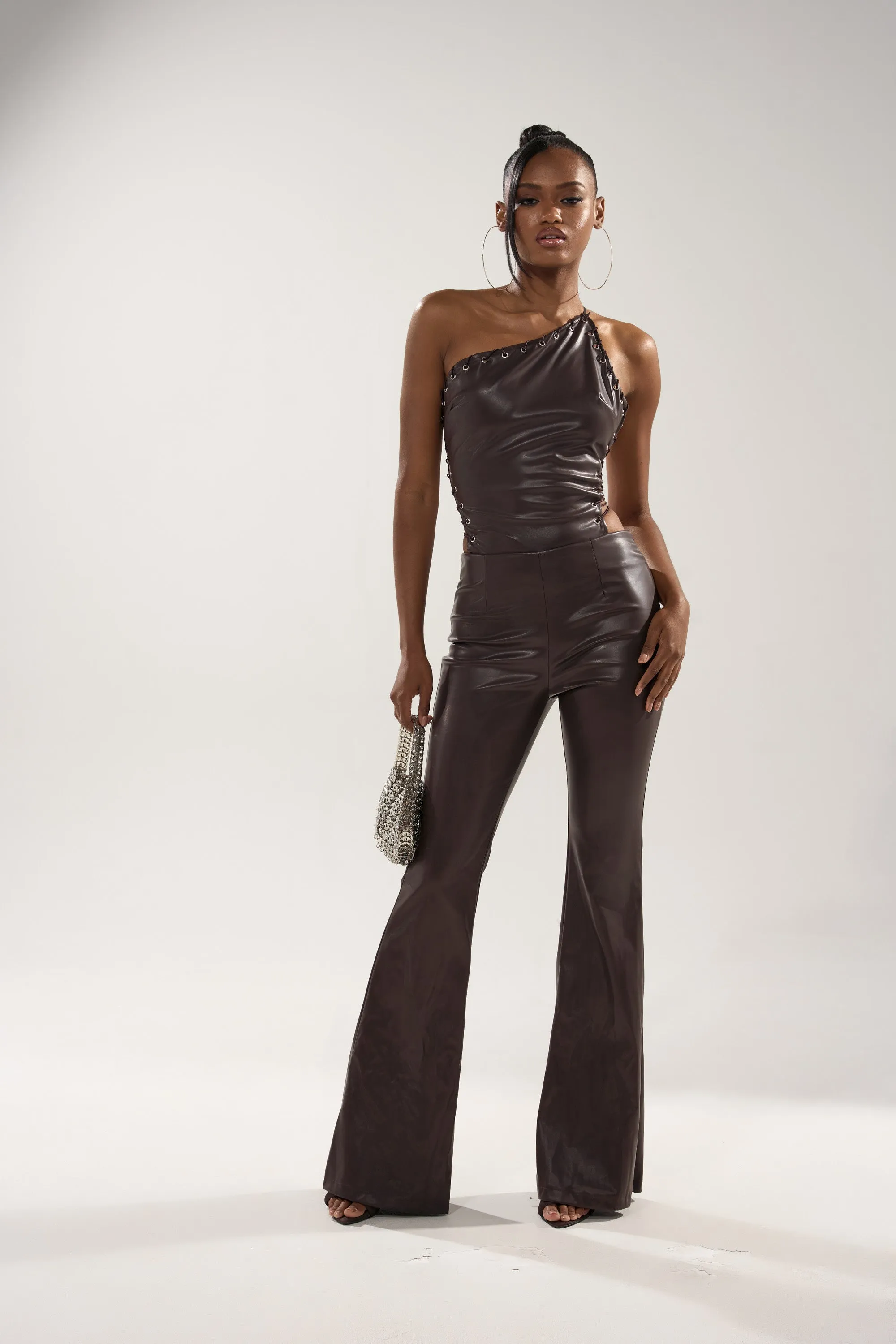 LEMME SHOW YOU WHAT I GOT PU JUMPSUIT sold by AKIRA