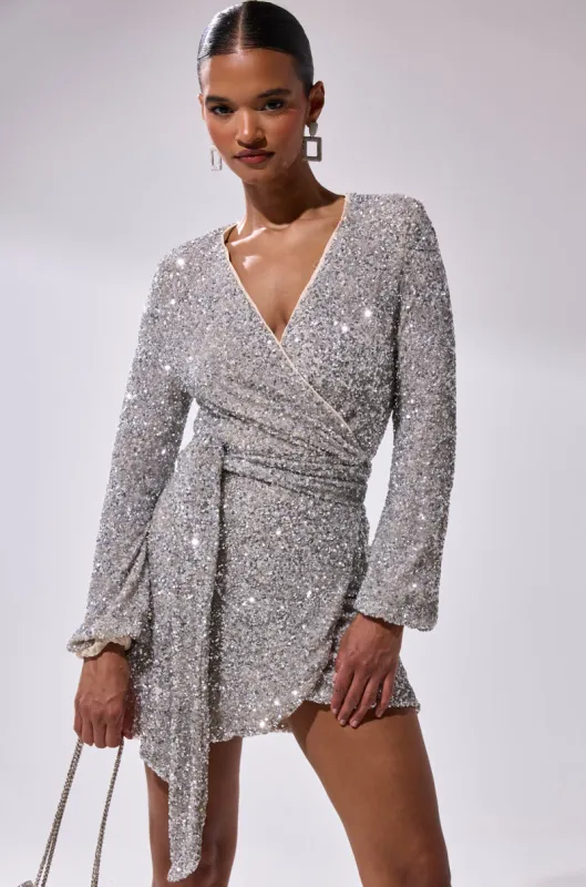 LORETTA SEQUIN WRAP MINI DRESS sold by AKIRA