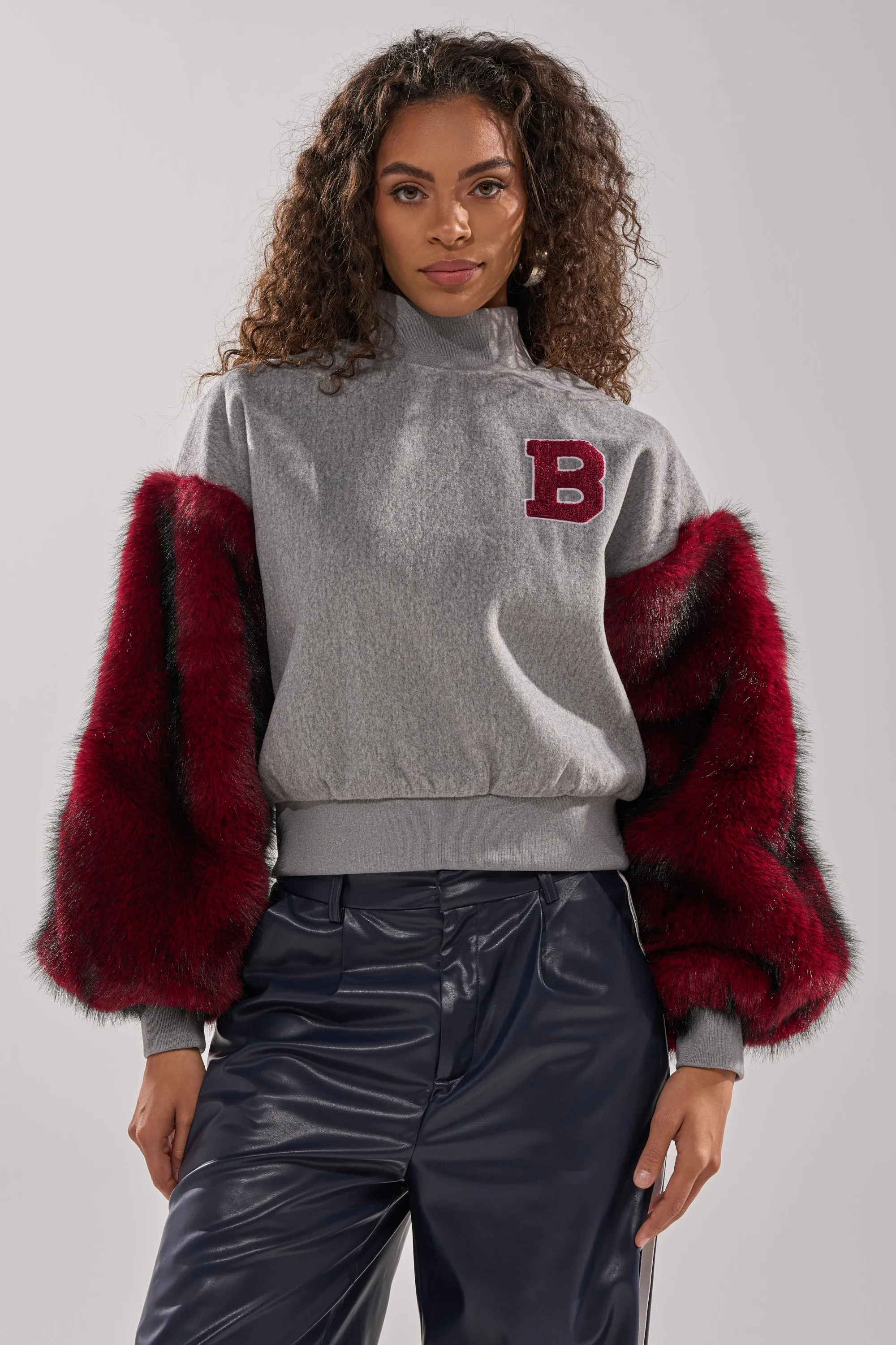 NEW EAST SIDE FAUX FUR SLEEVE SWEATSHIRT sold by AKIRA product image thumbnail 3