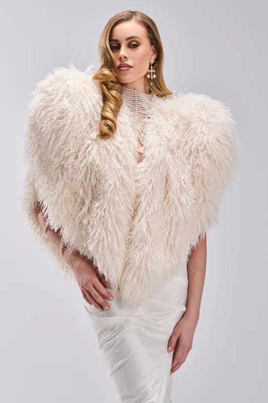 STAR CROSSED LOVER FAUX FUR VEST IN IVORY sold by AKIRA