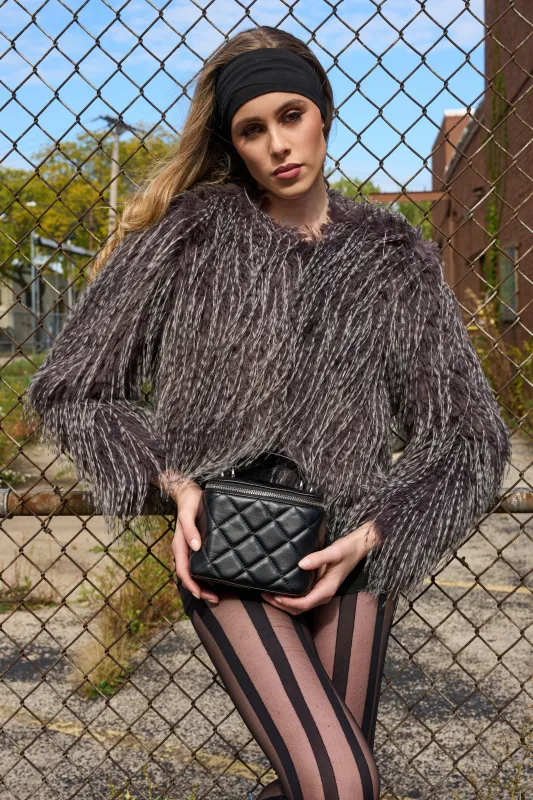 BIRDS OF A FEATHER SHAGGY FAUX FUR sold by AKIRA