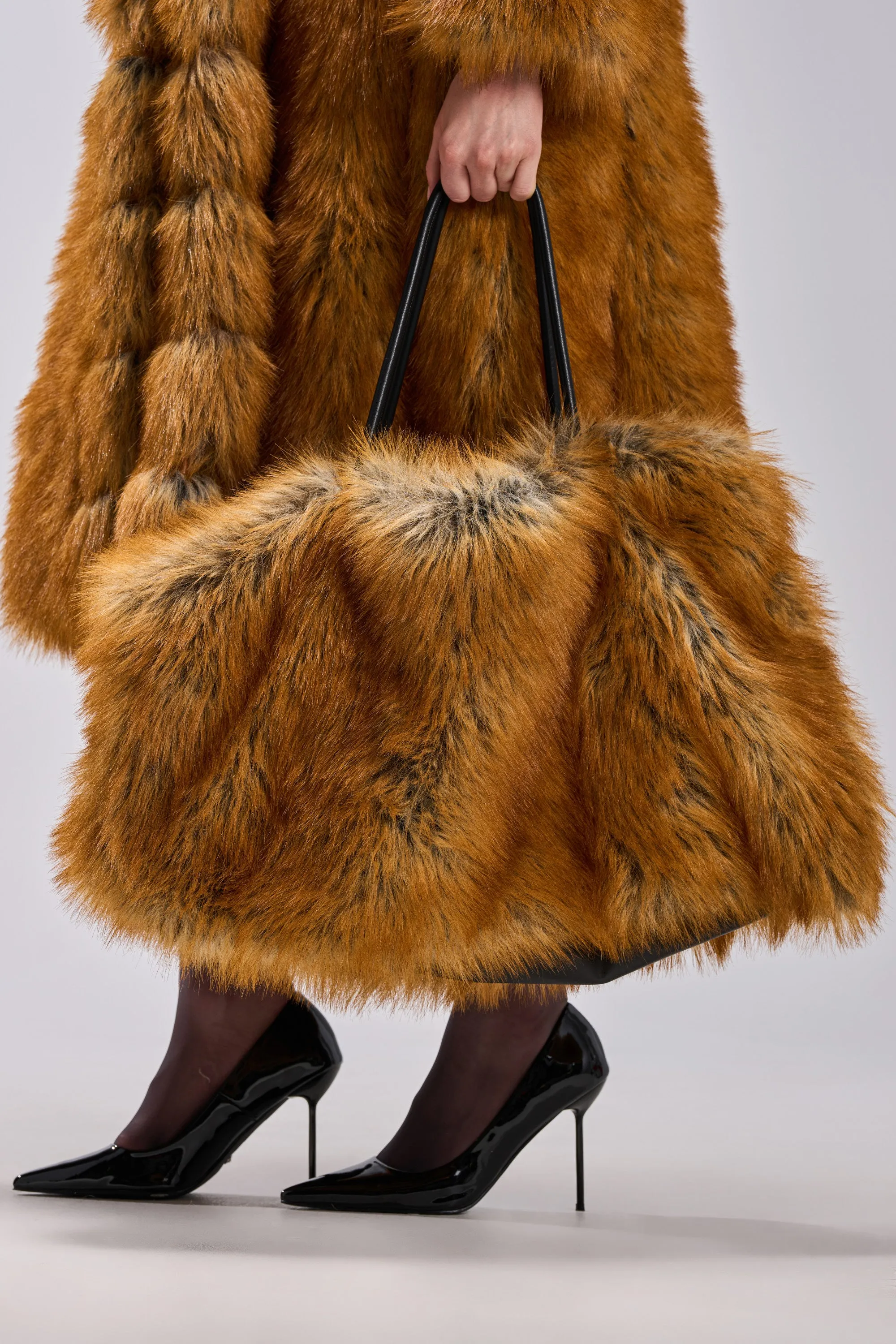 HERE FOR A GOOD TIME FAUX FUR TOTE sold by AKIRA