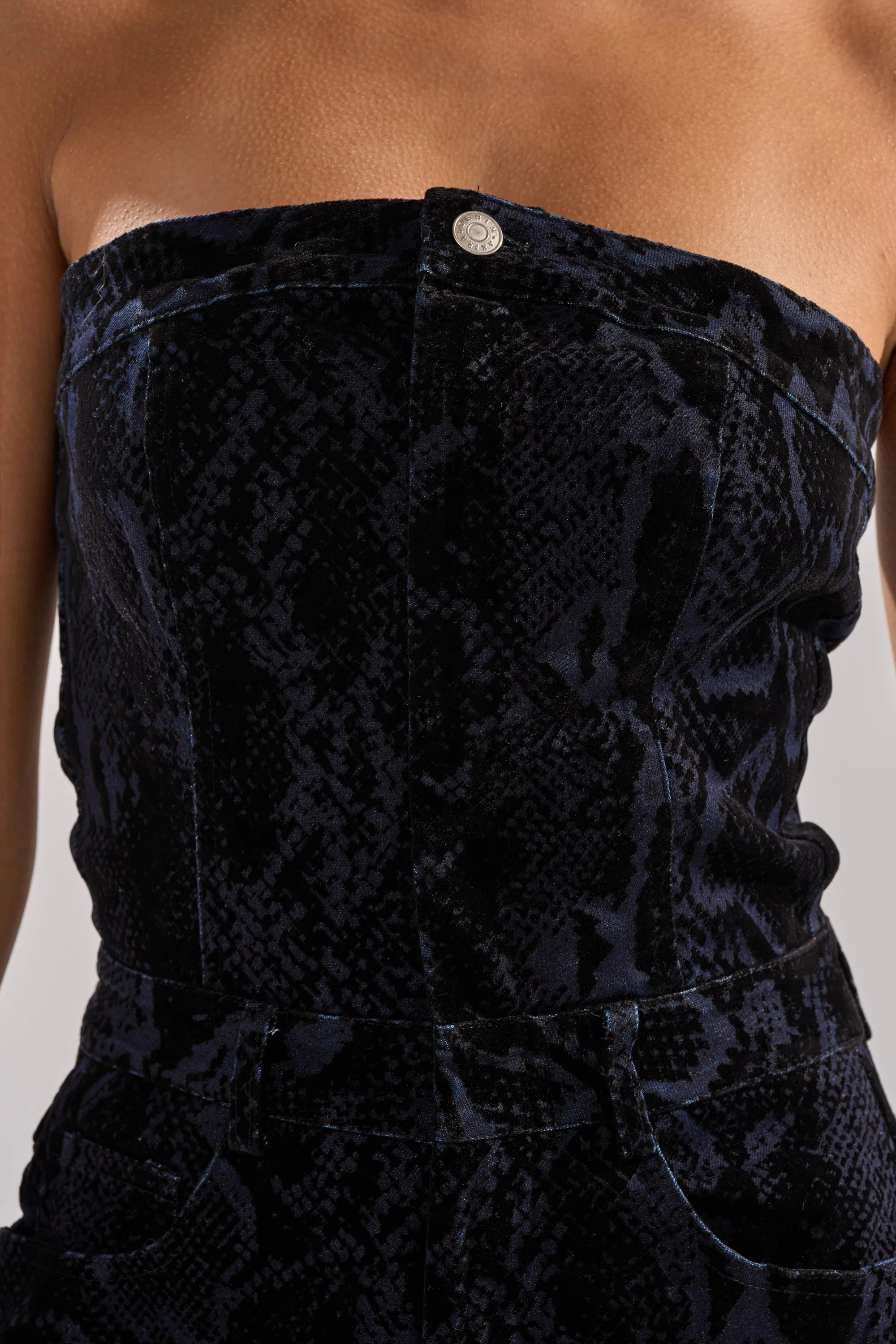 CAUGHT YOUR EYE VELVET DENIM JUMPSUIT IN SNAKEPRINT sold by AKIRA product image thumbnail 5