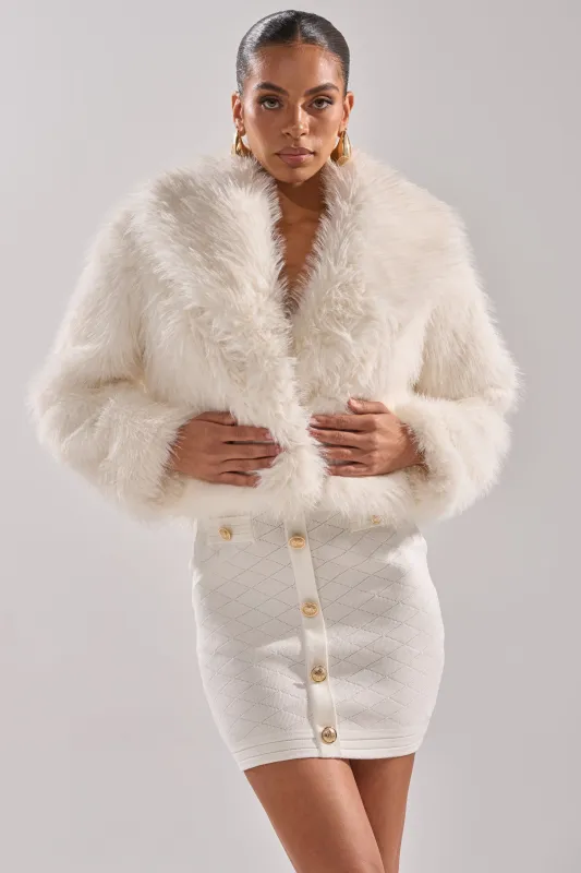 POPPY CROPPED FAUX FUR IN WHITE sold by AKIRA
