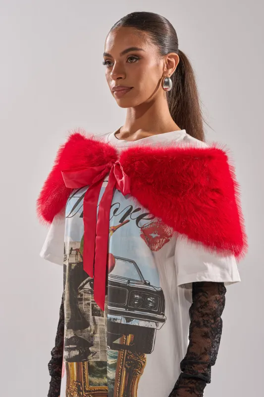 WITH A BOW FAUX FUR SHAWL sold by AKIRA