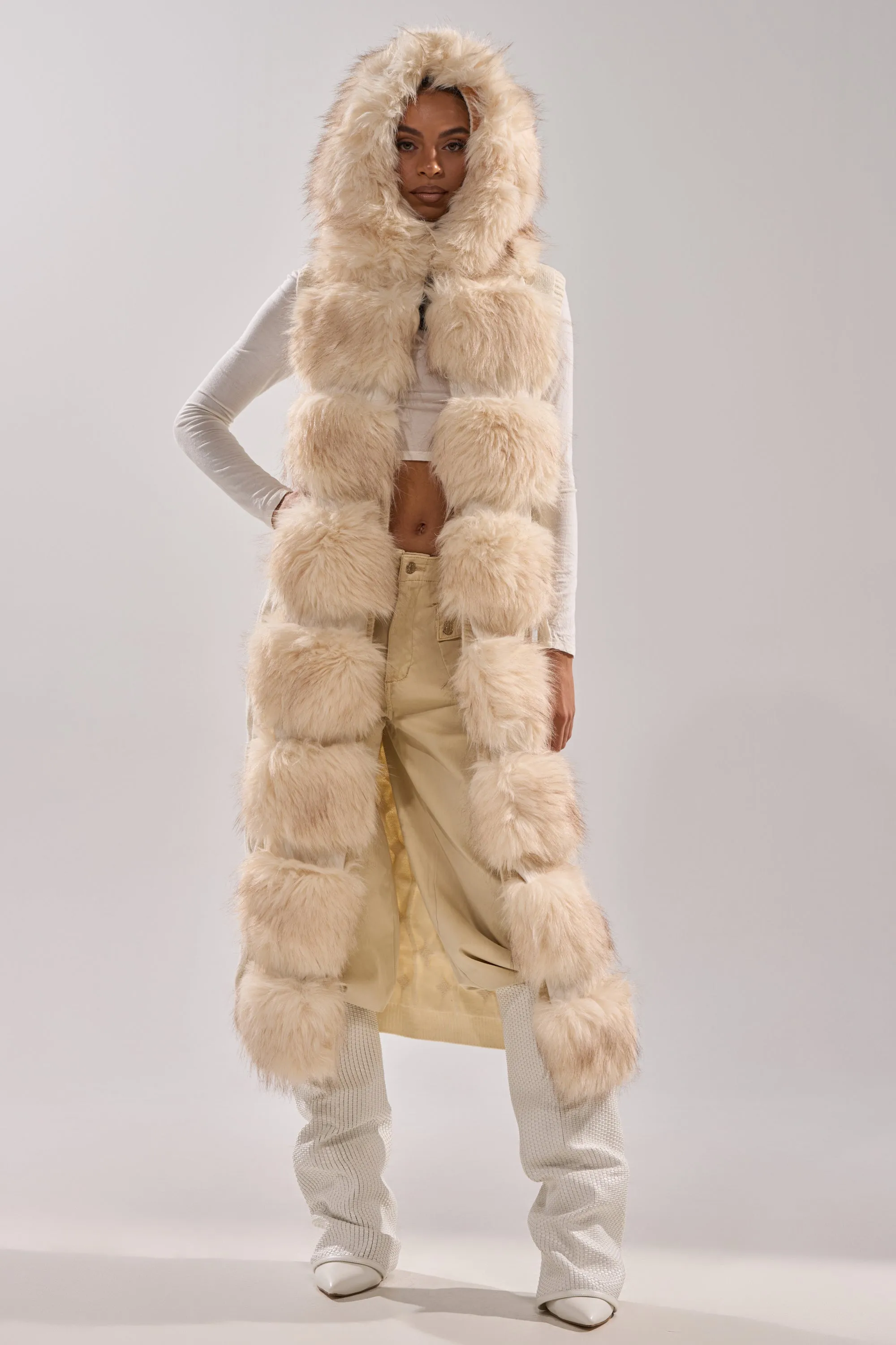 LUXURIOUS FAUX FUR HOODED VEST sold by AKIRA