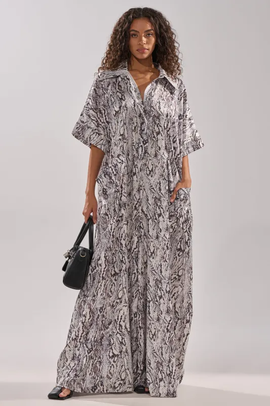 SHE'S RICH OVERSIZED SATIN JUMPSUIT IN SNAKE PRINT sold by AKIRA