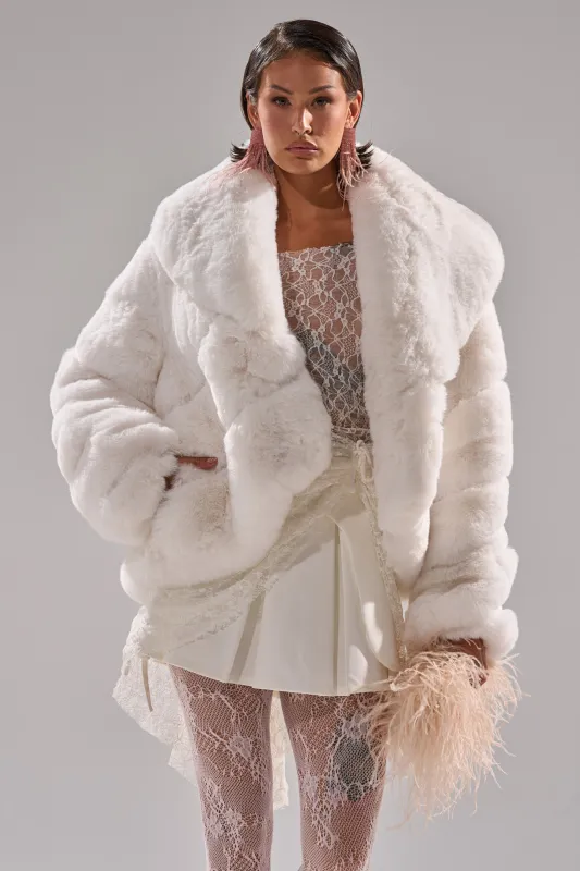 ELIXIR PANELED FAUX FUR IN WHITE sold by AKIRA