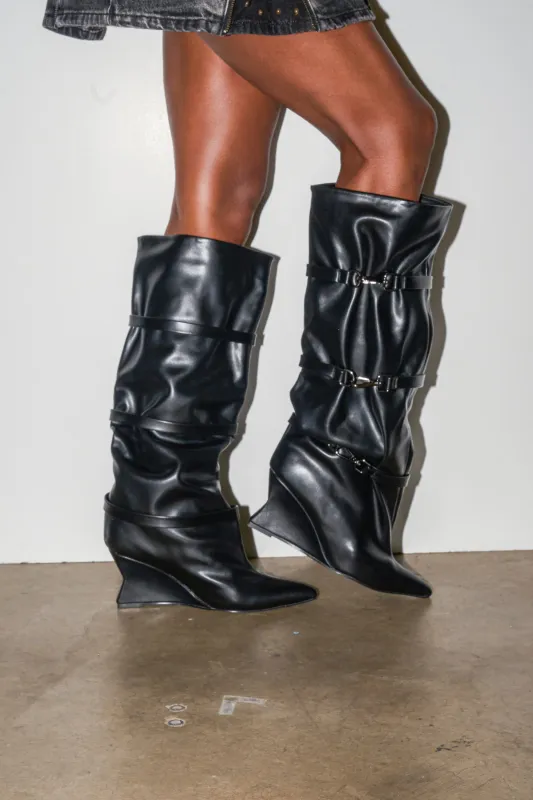 AZALEA WANG KULLERVO BLACK SILVER CLASP DETAIL WEDGE BOOT sold by AKIRA