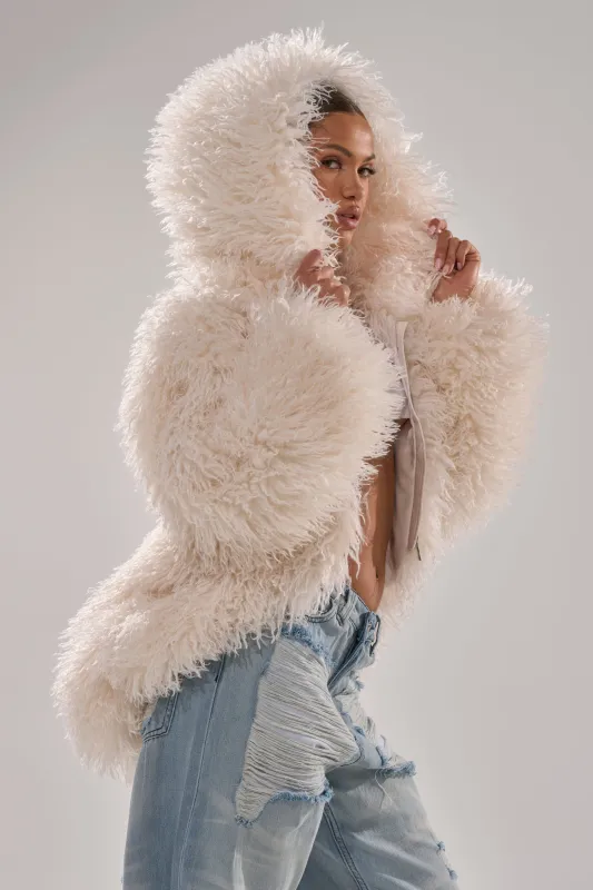 LOOK AT ME NOW HOODED FUR BOMBER IN IVORY sold by AKIRA