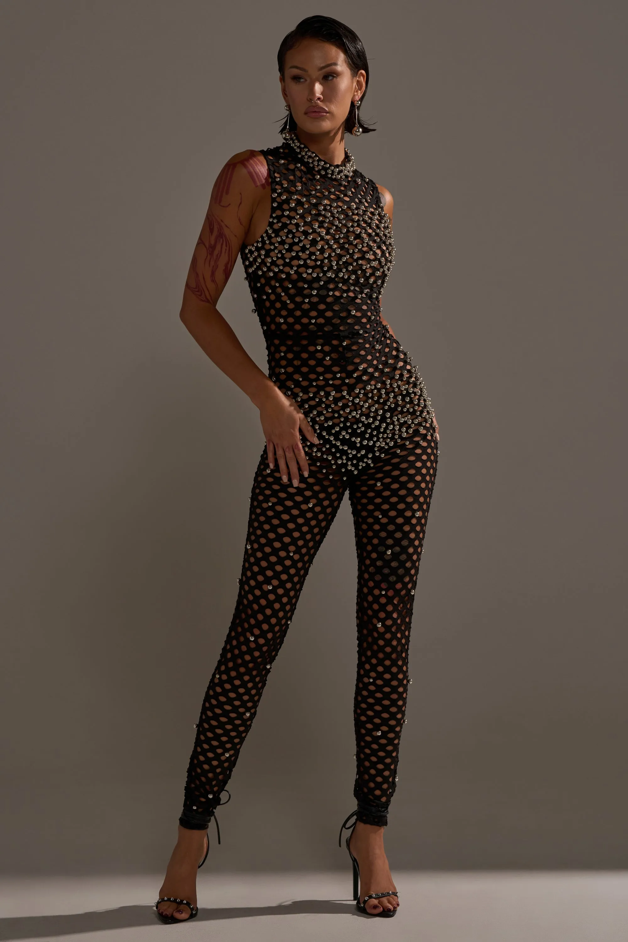 COULD NEVER BE ME BEADED MESH JUMPSUIT sold by AKIRA