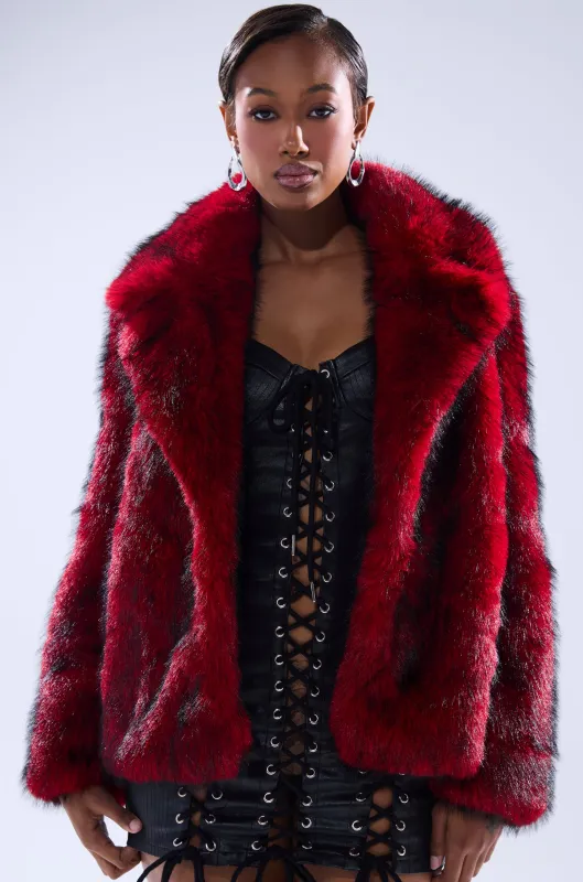 NO LOOKING BACK FAUX FUR IN RED MULTI sold by AKIRA