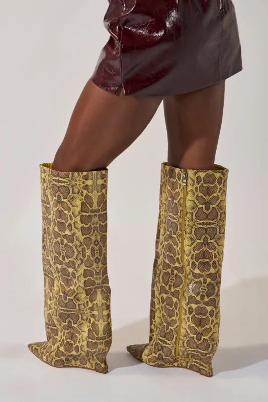 AZALEA WANG KENYA YELLOW SNAKE PRINT KNEE HIGH WEDGE BOOT sold by AKIRA