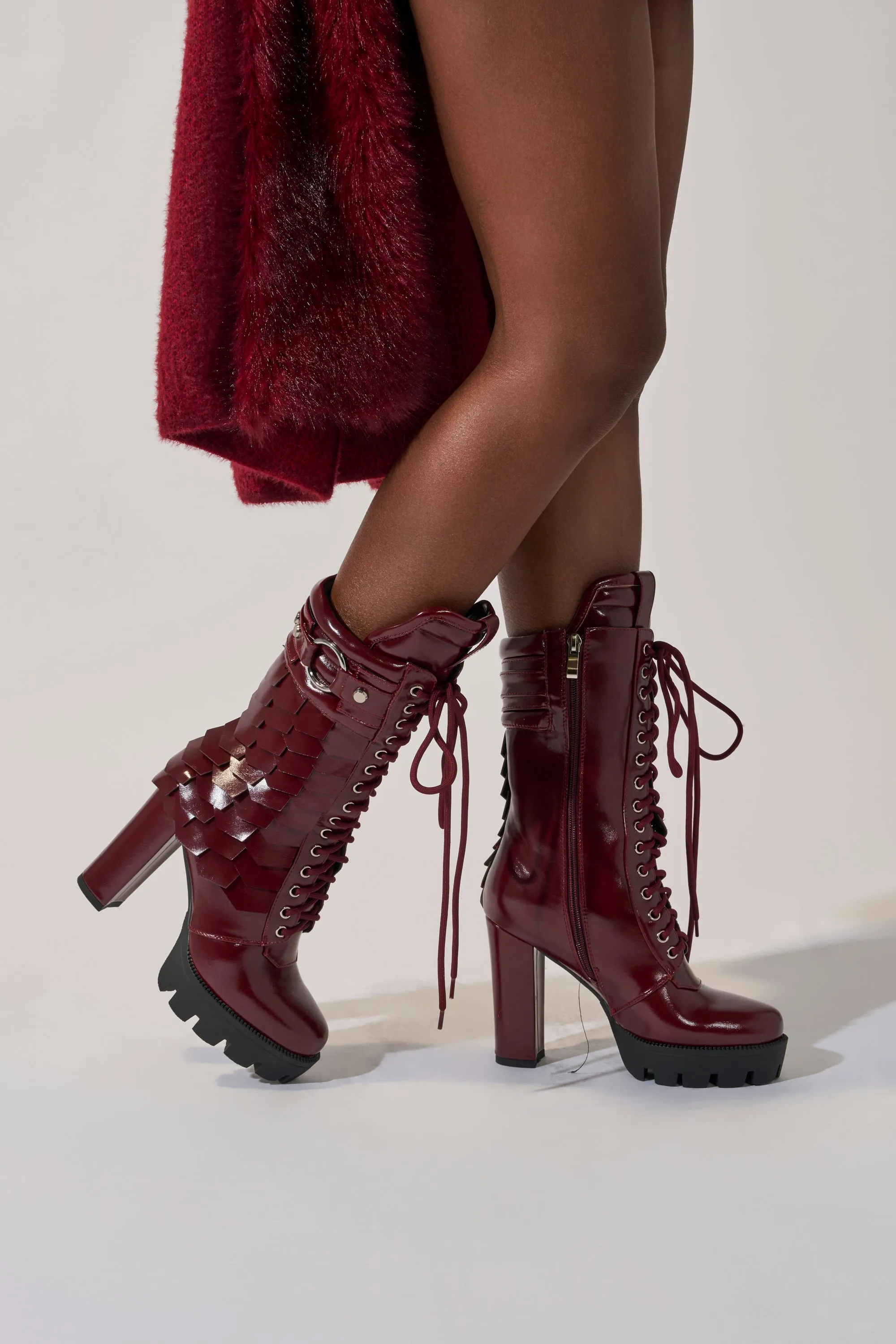 AZALEA WANG GERNOT BURGUNDY LACE UP SCALED PLATFORM BOOTIE sold by AKIRA