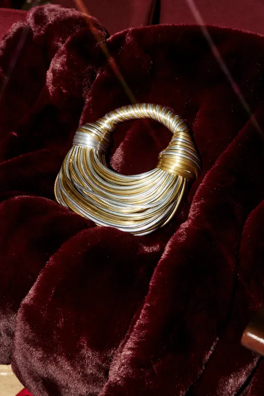 FIND ME OUTSIDE PURSE sold by AKIRA