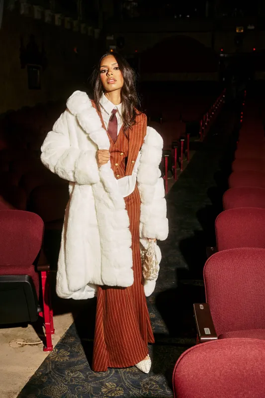 BERLIN HOODED FAUX FUR IN WHITE sold by AKIRA