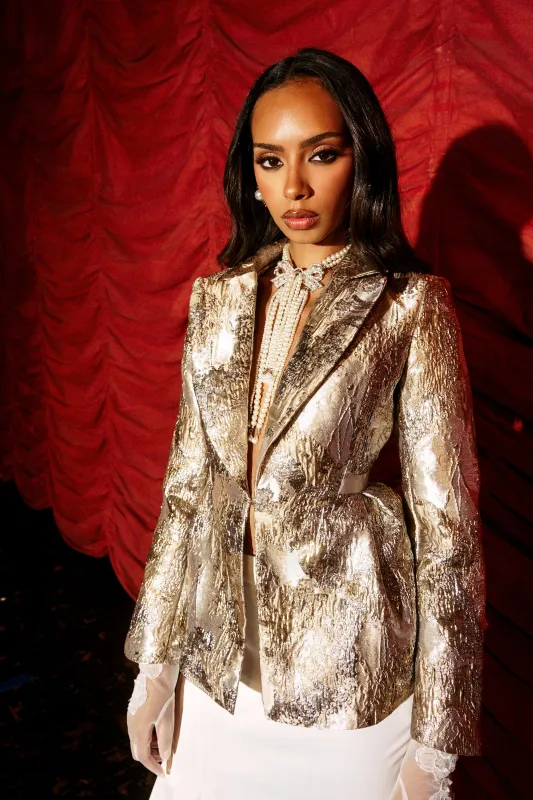 CANARY PEPLUM BLAZER IN CHAMPAGNE sold by AKIRA