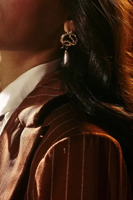 UR A SNAKE EARRING sold by AKIRA