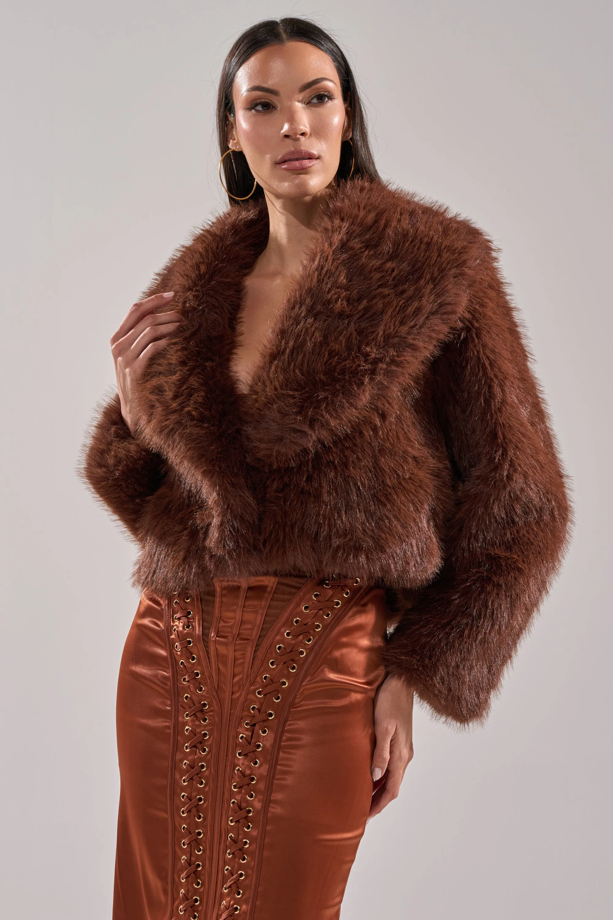 POPPY CROPPED FAUX FUR IN BROWN sold by AKIRA
