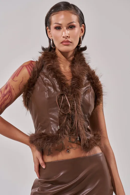 CANT MISS ME FAUX LEATHER FUR CORSET sold by AKIRA