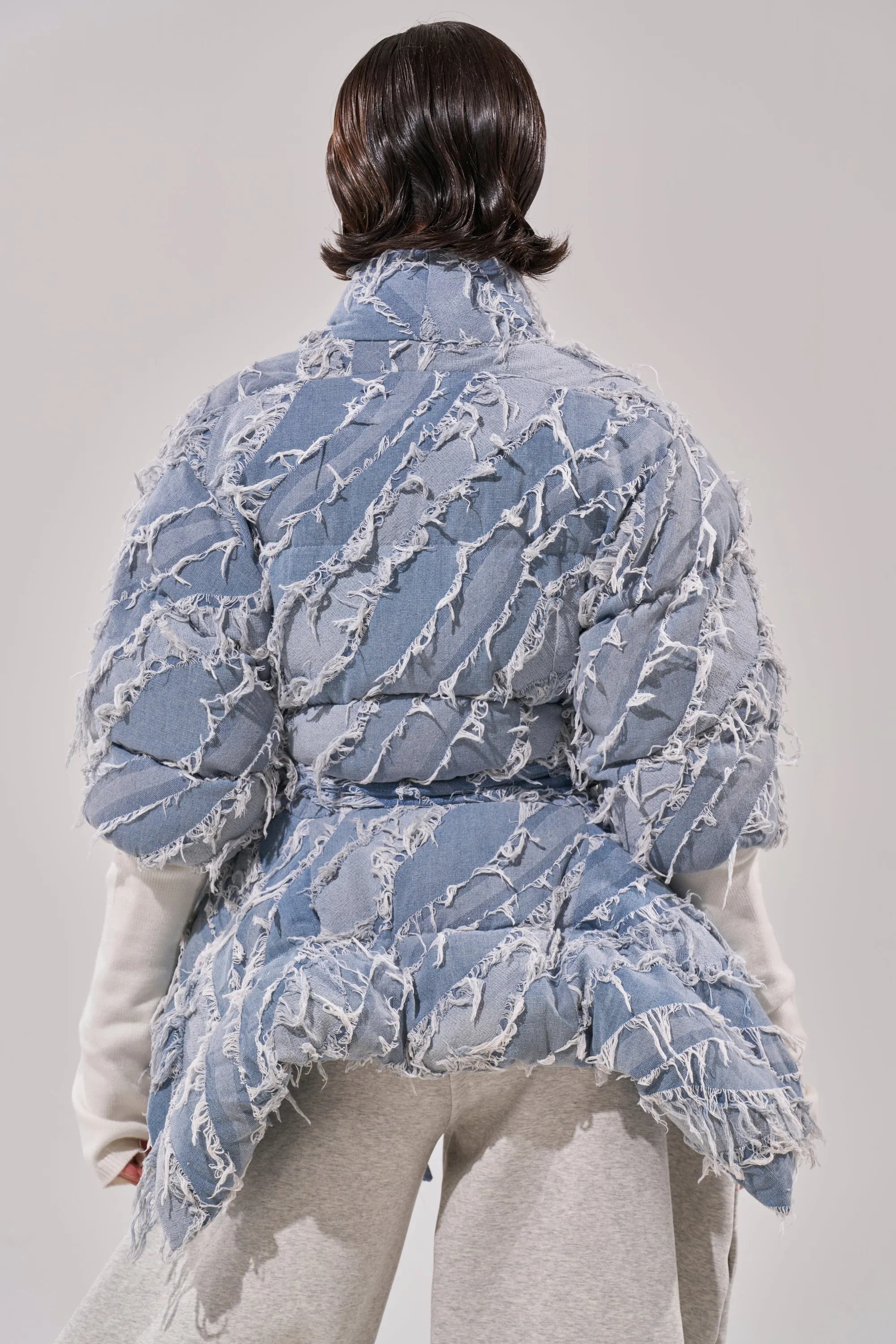 RIB SLEEVE PEPLUM PUFFER IN DENIM sold by AKIRA product image thumbnail 4
