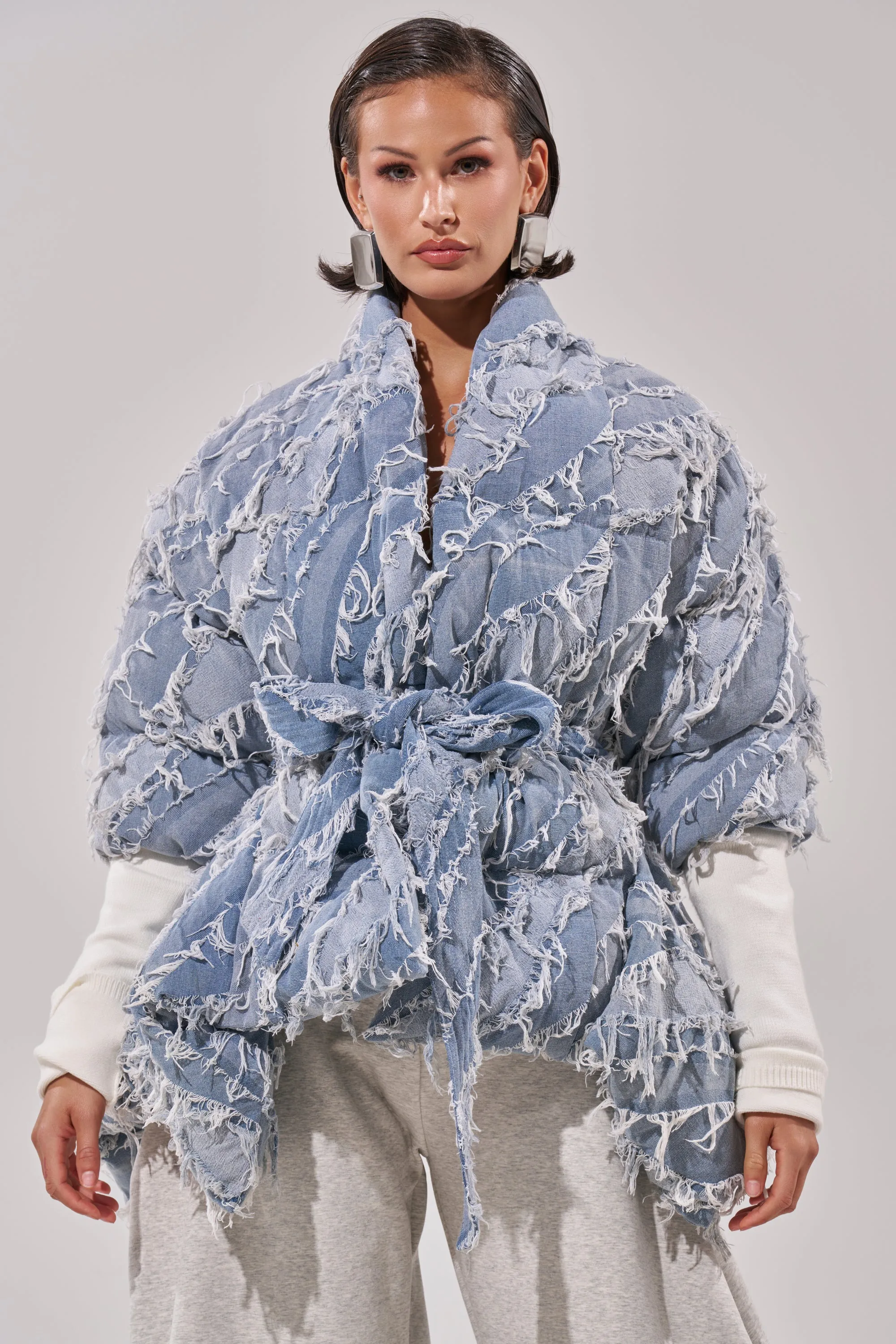 RIB SLEEVE PEPLUM PUFFER IN DENIM sold by AKIRA product image thumbnail 2