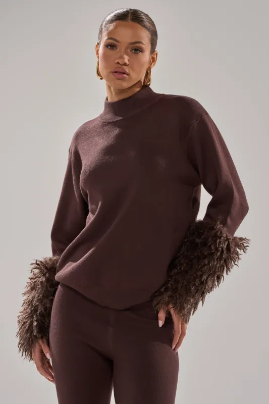 COZY VIBES SWEATER WITH FUR CUFF IN BROWN sold by AKIRA