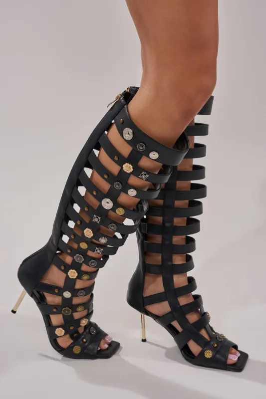 AZALWA WANG GOLD WENTWORTH GLADIATOR TWO TONED HARDWARE EMBELLISHED OPEN TOE SANDAL sold by AKIRA