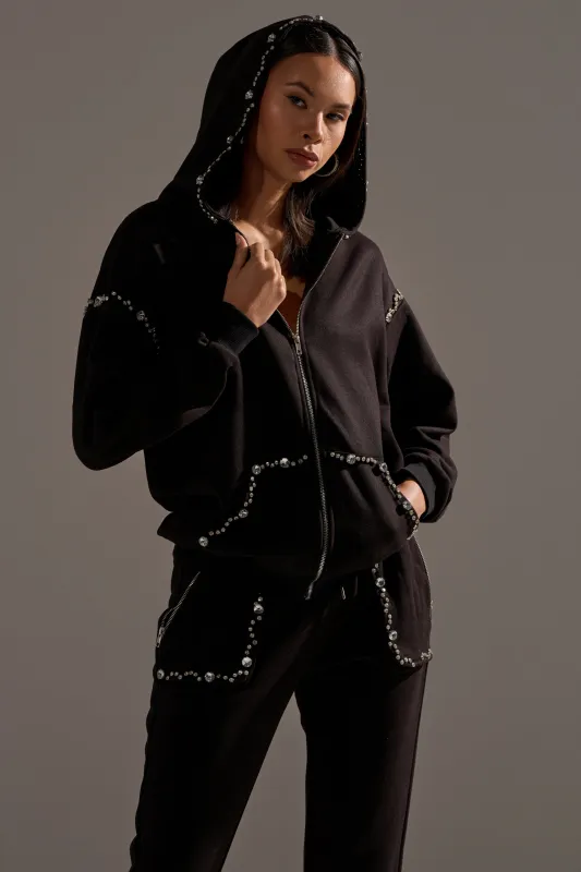 COZY HOLIDAY RHINESTONE ZIP UP SWEATSHIRT IN BLACK sold by AKIRA