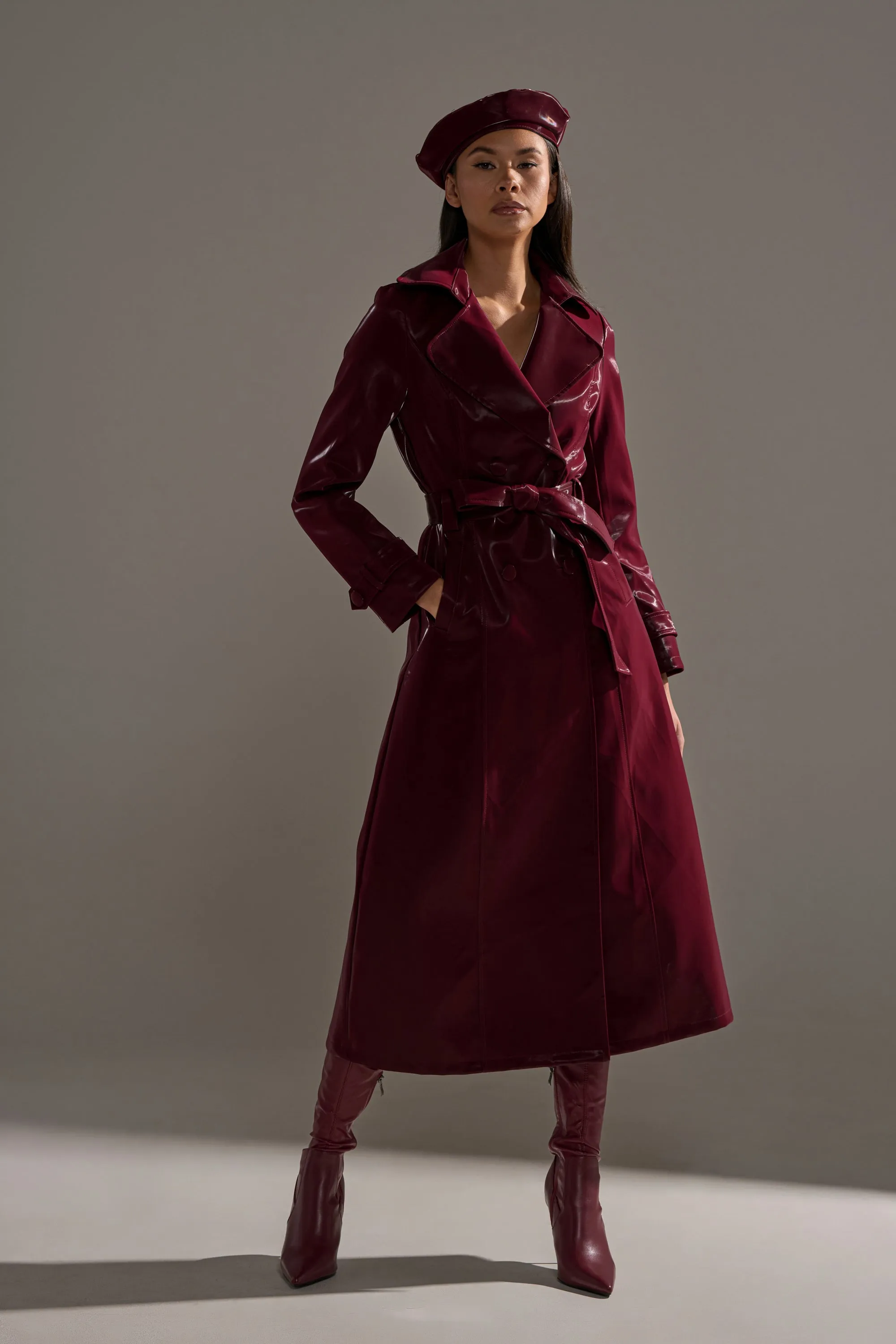SANDO LIQUID VELVET TRENCH IN BURGUNDY sold by AKIRA