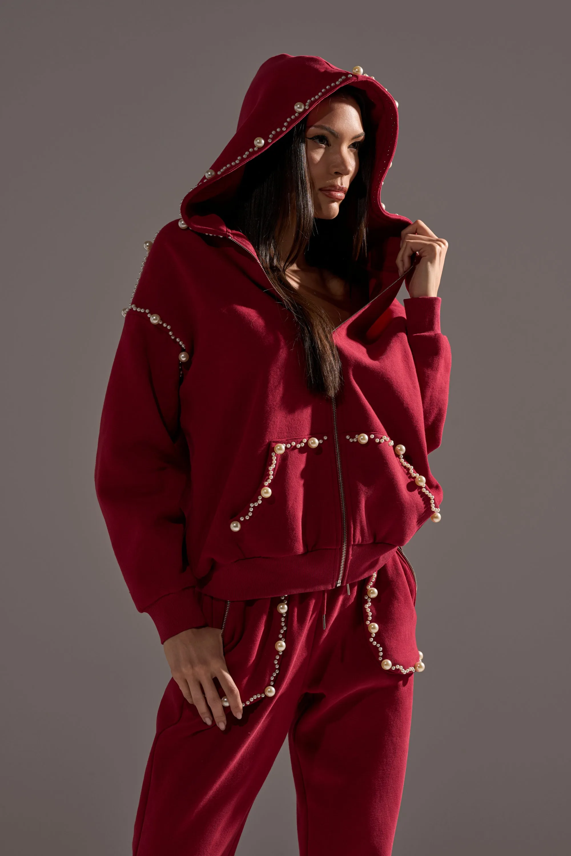 COZY HOLIDAY PEARL SWEATSHIRT IN BURGUNDY sold by AKIRA