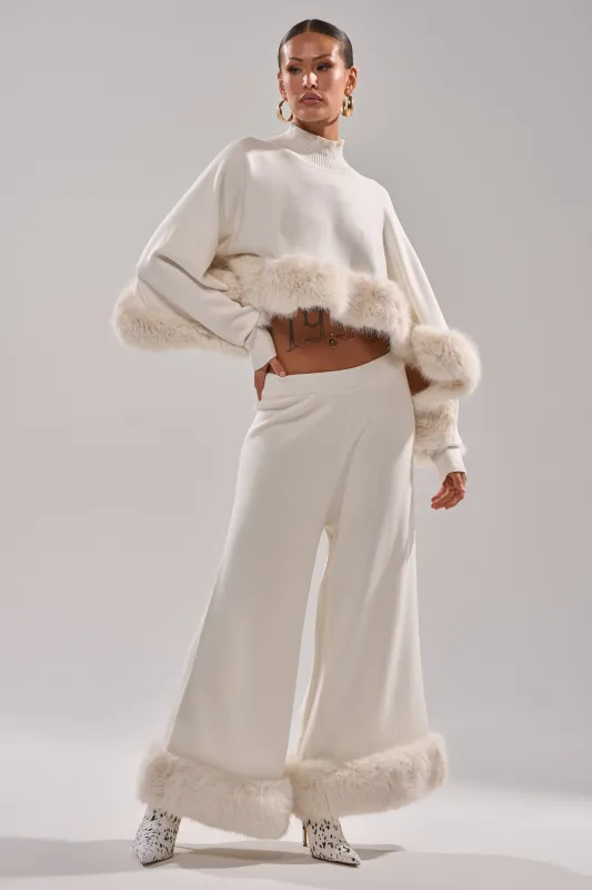 QUIET LUX FUR TRIM SWEATER PANTS IN WHITE sold by AKIRA