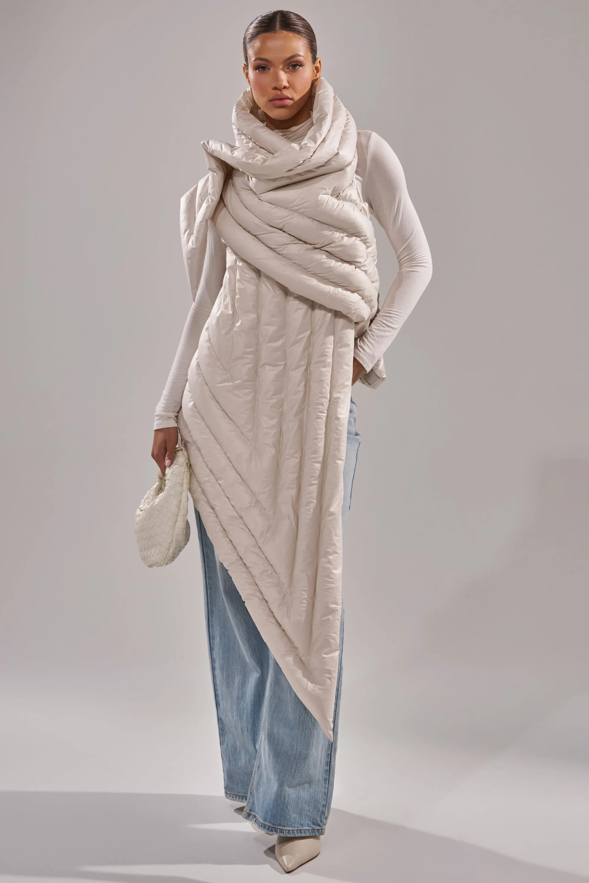 FOR THE DRAMA PUFFER VEST IN IVORY sold by AKIRA