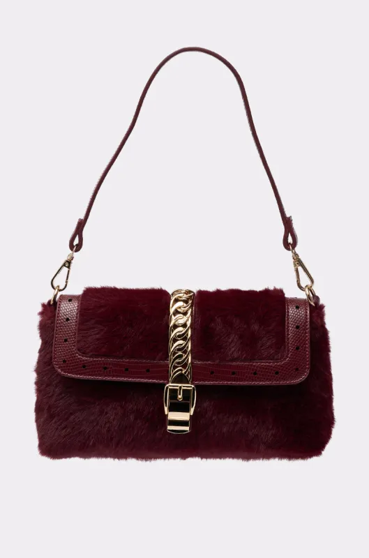 LOUIS FAUX FUR PURSE sold by AKIRA