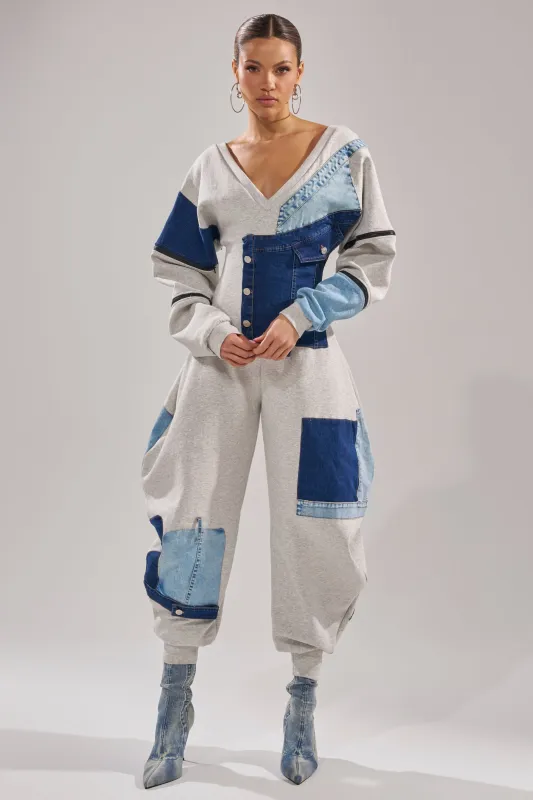 COMFY COZY SWEATSHIRT JUMPSUIT IN PATCHWORK DENIM sold by AKIRA
