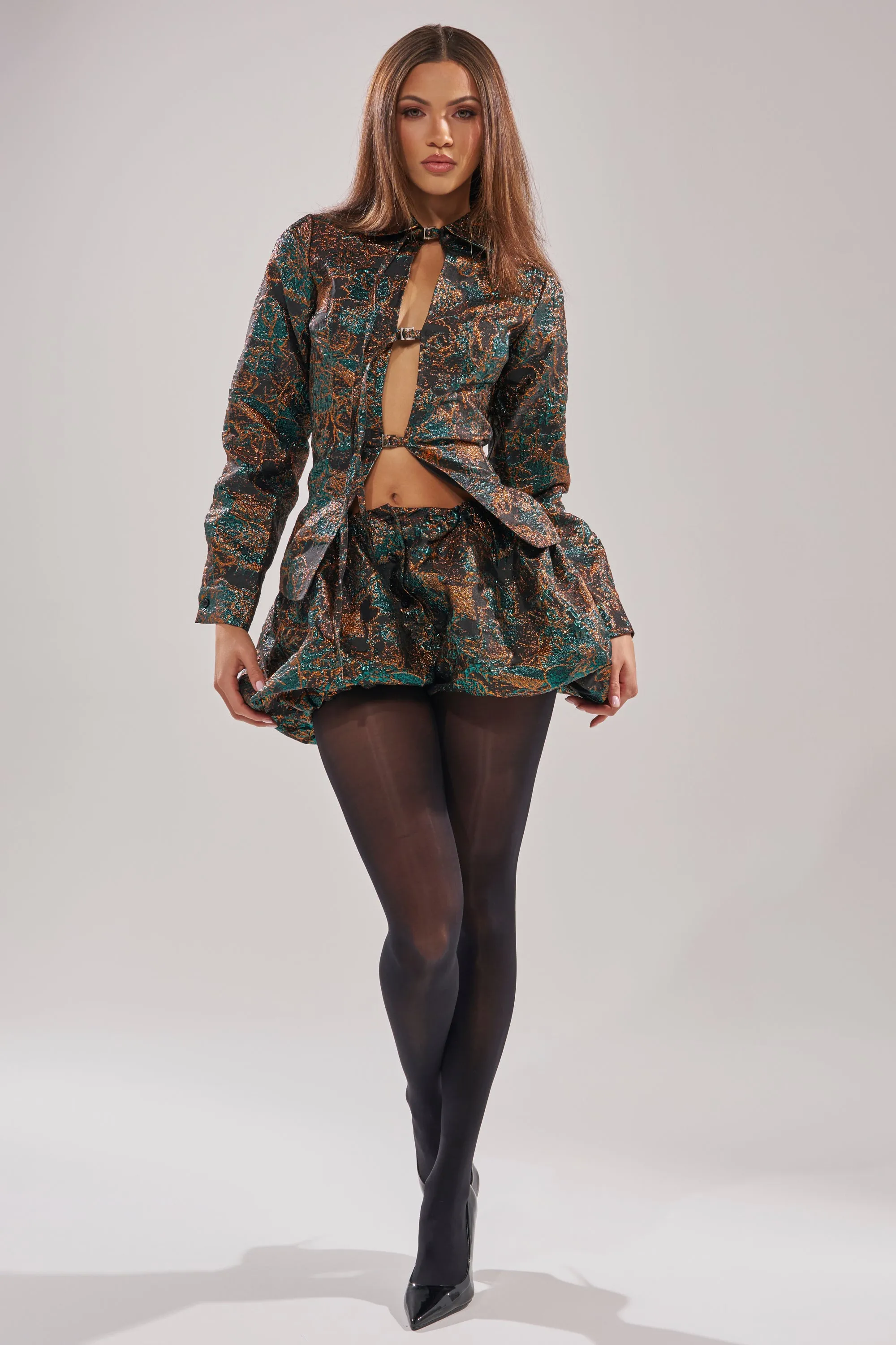 TOO HOT TO HANDLE BUBBLE SHORT sold by AKIRA