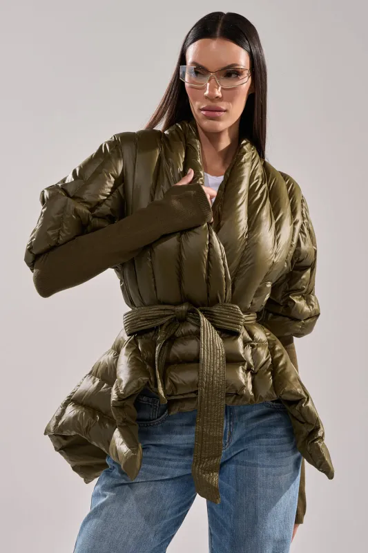 RIB SLEEVE PEPLUM PUFFER IN OLIVE sold by AKIRA