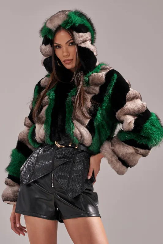 SUPERNOVA PANELED FAUX FUR IN GREEN sold by AKIRA